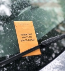 Image Unpaid parking tickets. How to find the right debt relief agency?